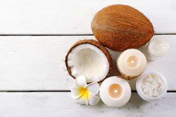 Wall Mural - Spa coconut products on light wooden background