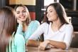 © Africa Studio - Attractive girls resting in cafe
