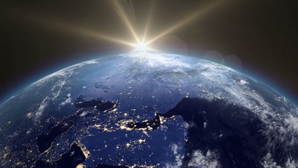 Wall Mural - Beautiful Sunrise Over The Earth. The transition from night to day. Sunrise From Space. Earth From Space. v.2.