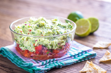 Poster - Bowl of guacamole with salsa