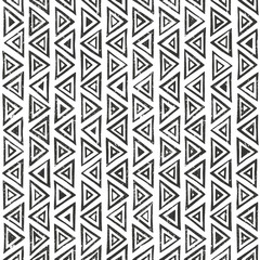 Abtract geometric pattern with triangles. Hand drawn tribal seamless background.