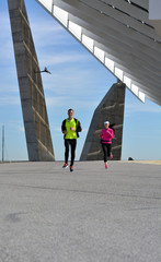 Wall Mural - couple practicing running in the city