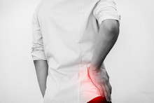 Young Man In Casual Office Shirt Having Hip Pain (Selective Focus)