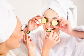 Poster - Ridiculous young women with towels on their heads feeding ech ot