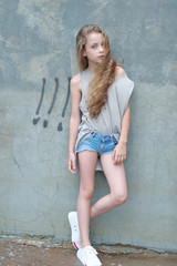portrait of little girl outdoors in summer
