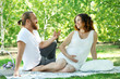 © Africa Studio - Happy couple on white blanket in the park
