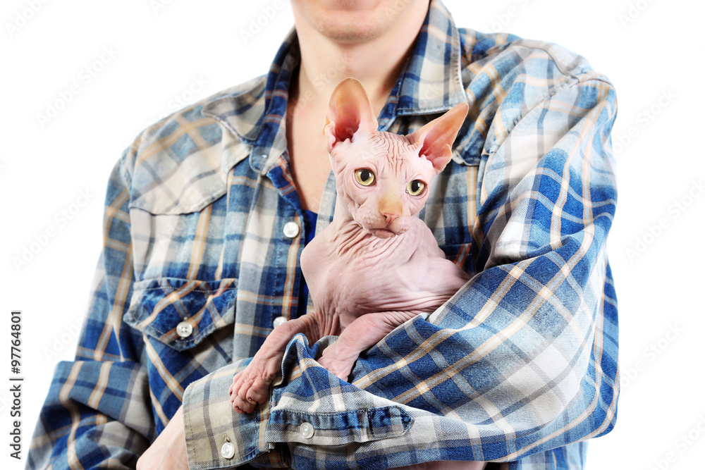 Young man holding a cat, isolated on white