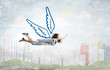 © Sergey Nivens - Woman flying high