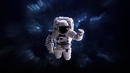  Astronaut in outer space. Elements of this image furnished by NASA
