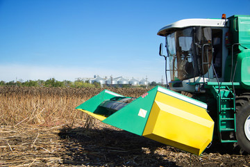 Poster - Combine harvests in the field