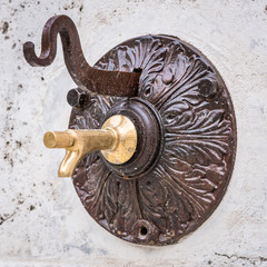 public water fountain carved stone with two spouts