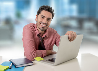 Wall Mural - businessman working at office computer happy satisfied and successful