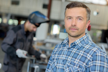 man in the welding shop