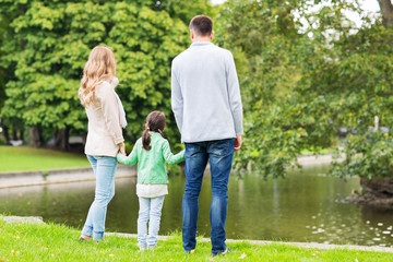 Wall Mural - family walking in summer park