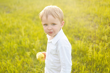 Portrait of a boy in the summer outdoors