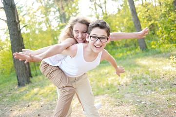 Portrait of a boy and girl  in summer