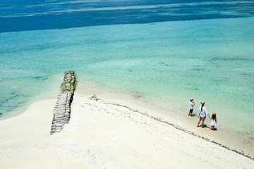 Wall Mural - Mother and kids at tropical beach