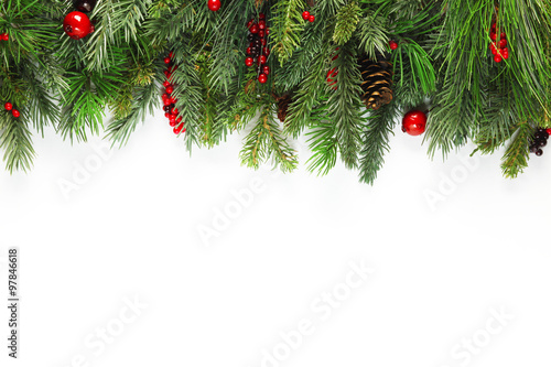 Christmas tree branch with holly decor. ... | Stock Photo ...