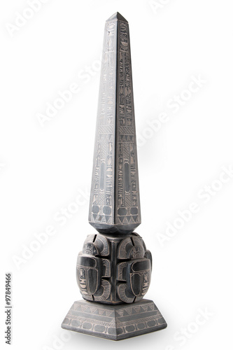 Cuadros en Lienzo Obelisk carved in alabaster stone isolated on white background, an Anciant egypt
