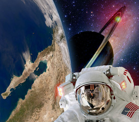 Wall Mural - astronaut helmet spaceman extraterrestrial saturn planet sci fi space travel. elements of this image