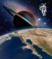 Wall Mural - astronaut spaceman saturn planet sci fi outer space walk suit spacewalk. elements of this image furn