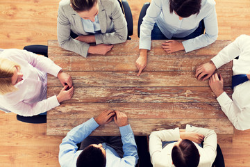 Sticker - close up of business team sitting at table