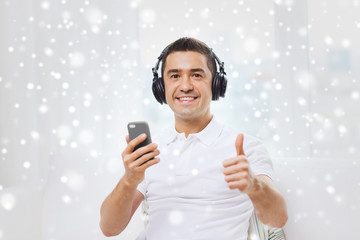 Poster - happy man with smartphone and headphones