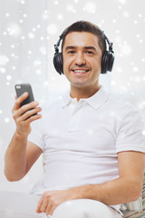 Poster - happy man with smartphone and headphones