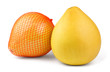 Two ripe pear-shaped pomelo fruit isolated on white background. One of them is wrapped in plastic mesh.
