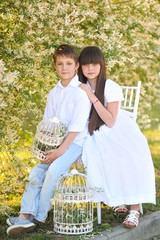 Wall Mural - Portrait of a boy and girl  in summer