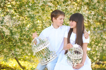 Wall Mural - Portrait of a boy and girl  in summer