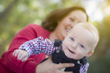 Little Baby Boy Having Fun With Mommy Outdoors