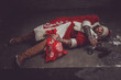 © Fxquadro - Drunk man in santa's clothes.