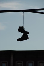 Hanging Pair Of Shoes On A Wire