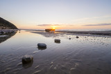 Fototapeta Fototapety z morzem do Twojej sypialni - Kamienista plaża pod klifem w Wolińskim Parku Narodowym