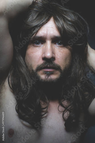 Sexy Naked Man With Long Dark Hair Intense Eyes And Blue