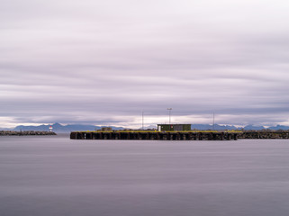 Horizontal dramatic Norway northern pier quay cloudscape backgro