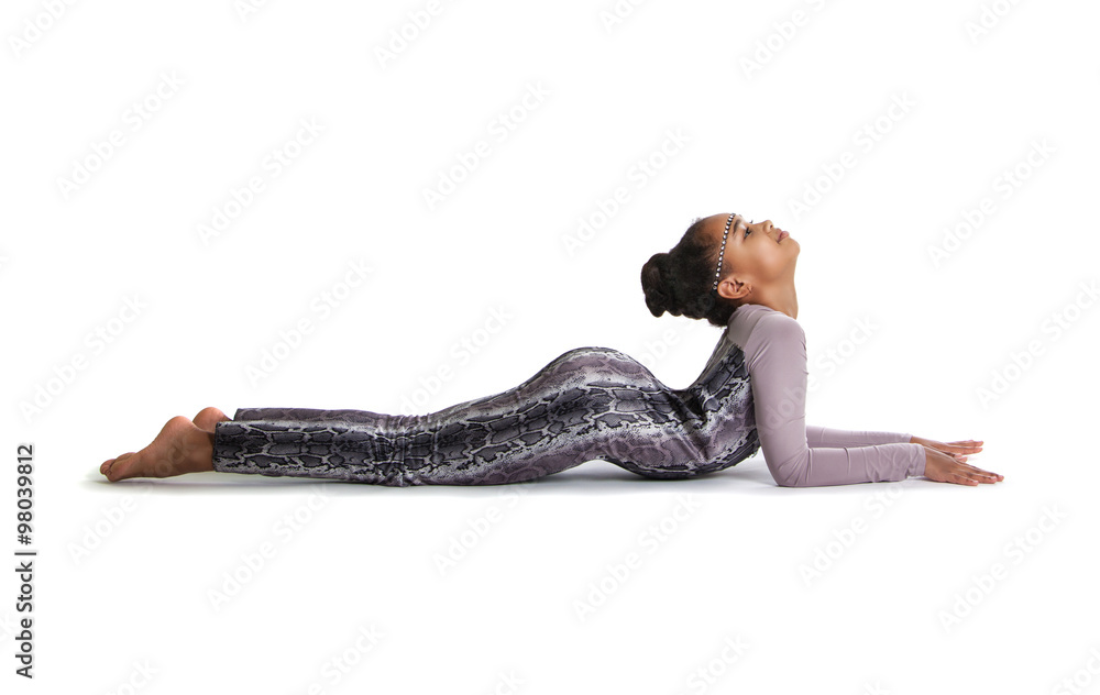 little girl doing gymnastics. Flexible girl lying on the floor Stock ...
