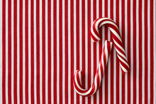 Peppermint Candy Canes On Striped Background
