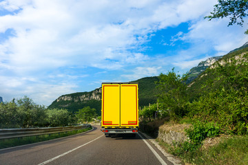 Wall Mural - Cargo truck on the mountain. truck on road. Cargo transportation