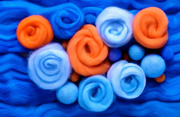 Wall Mural - Eight stylized roses made of wool for felting. Blue and orange