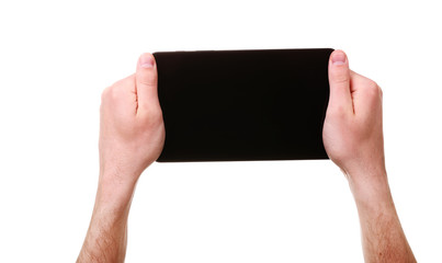 male hands holding a tablet touch computer gadget with black scr
