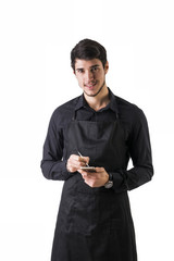 Wall Mural - Full length shot of young chef or waiter posing isolated 