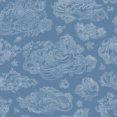 Rolling Clouds seamless pattern.
Hand drawn seamlessly repeating ornamental wallpaper or textile pattern with cloud motives .
