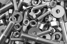 Mixture Of Stainless Steel Nuts Bolts And Washers / A Mixture Of Stainless Steel Nuts Bolts And Washers In A Heap