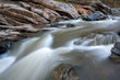© Nattapol_Sritongcom - creek flowing over the rocks