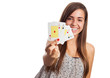 © asierromero - portrait of young woman showing poker cards isolated on white