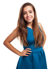 Wall Mural - pretty young girl wearing a blue dress isolated on a white backg