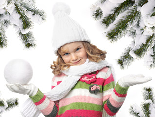 Wall Mural - girl in winter clothes christmas tree covered with snow