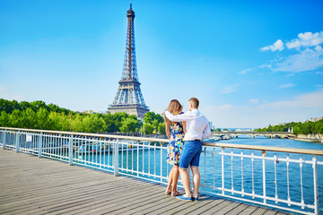 Wall Mural - Young romantic couple having a date in Paris